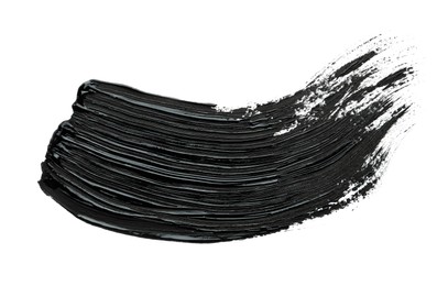 Brushstrokes of black oil paint on white background, top view