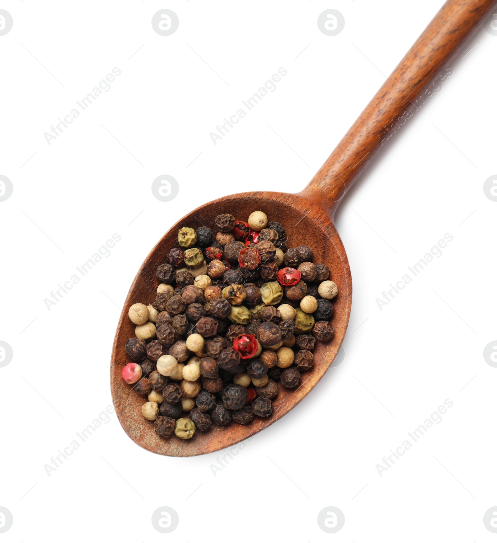 Photo of Aromatic spices. Different peppers in wooden spoon isolated on white, top view