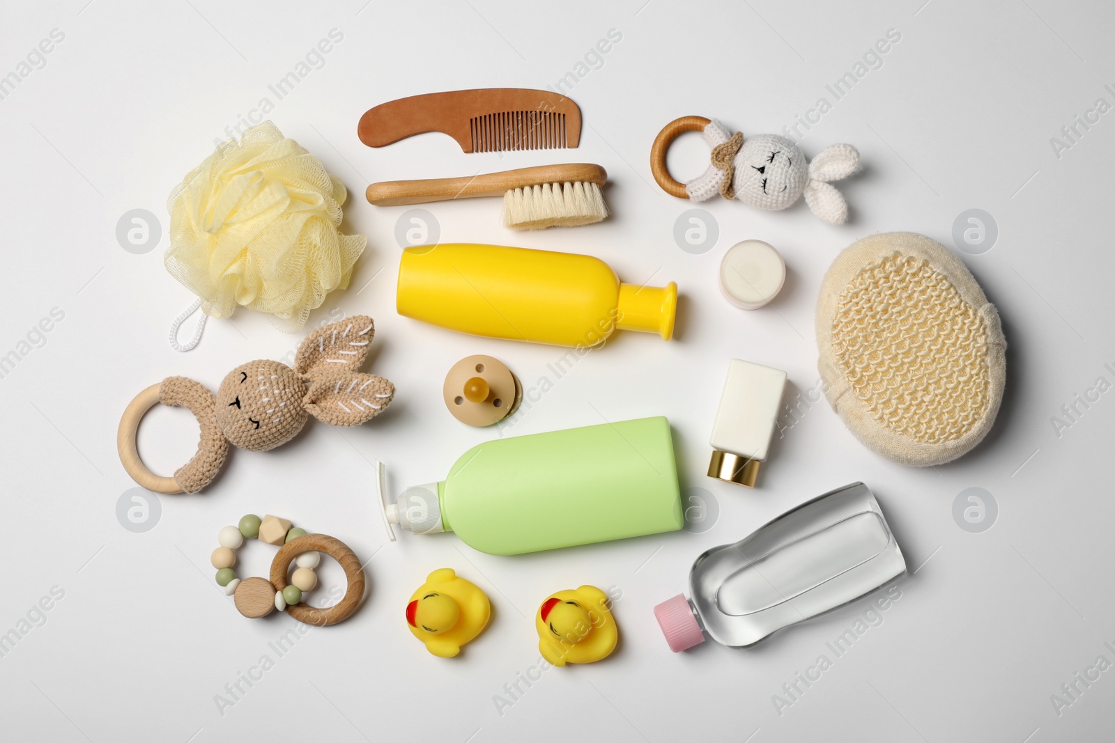 Photo of Baby cosmetic products and accessories on white background, top view