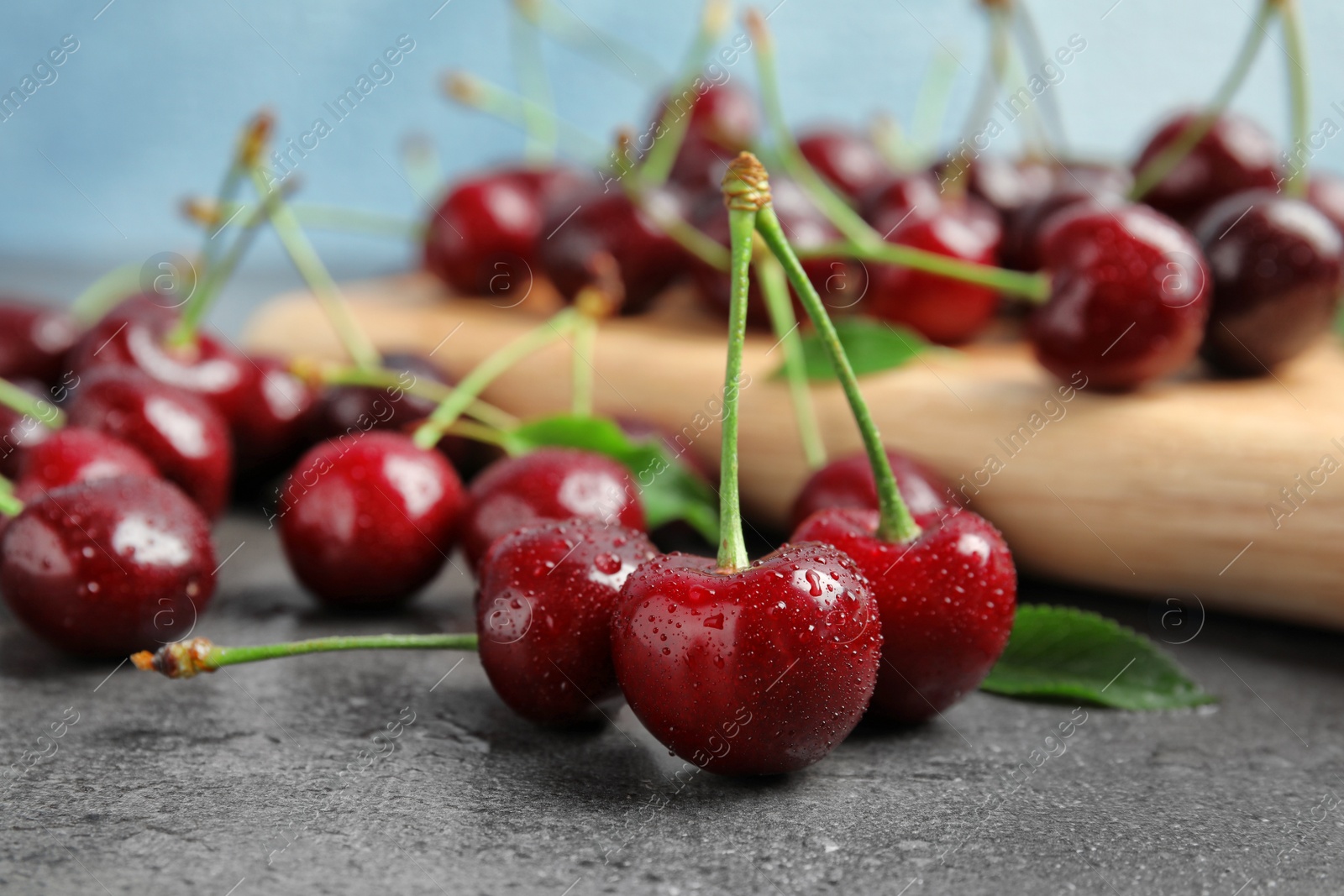 Photo of Sweet red cherries on table