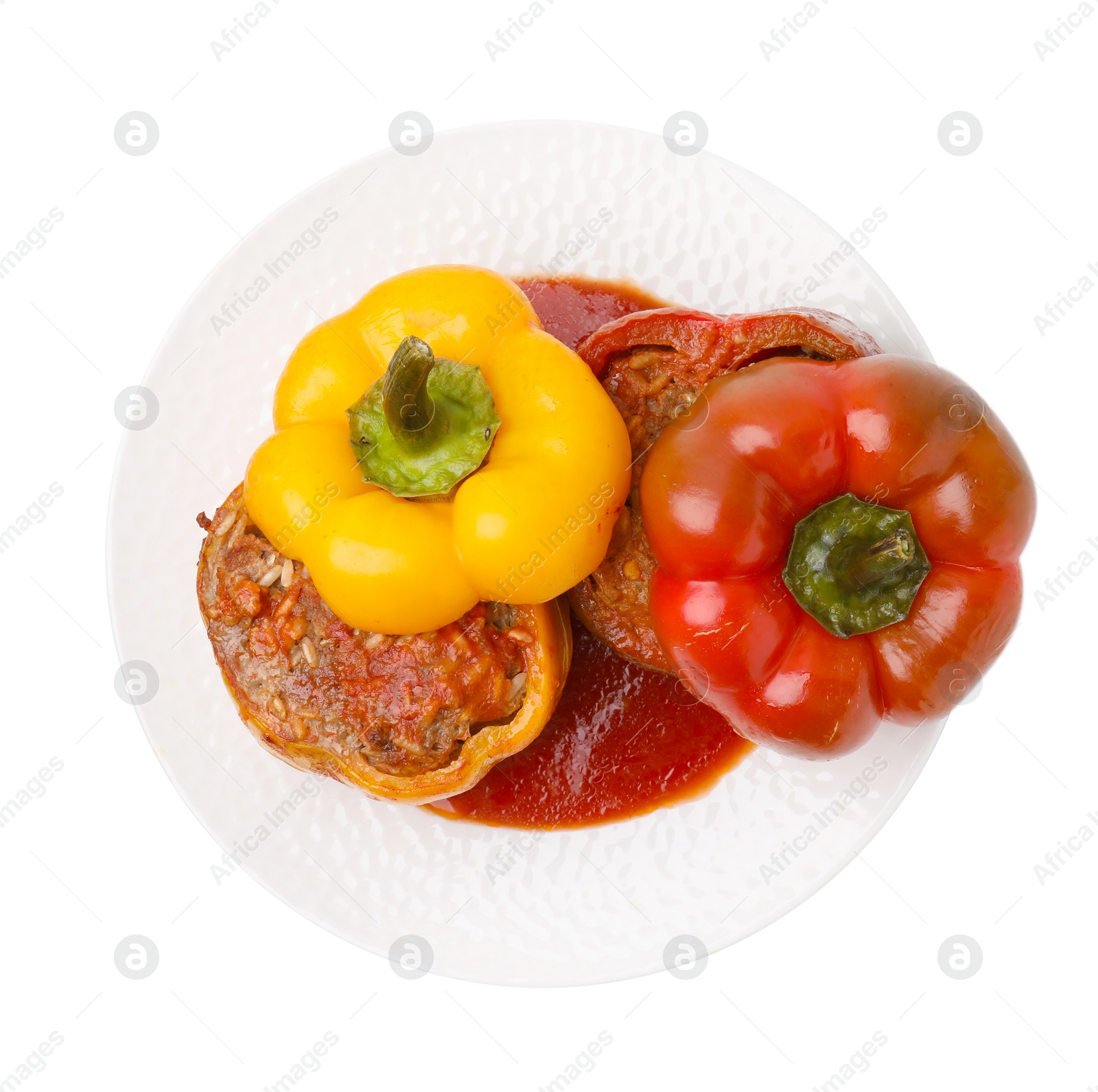 Photo of Delicious stuffed bell peppers isolated on white, top view