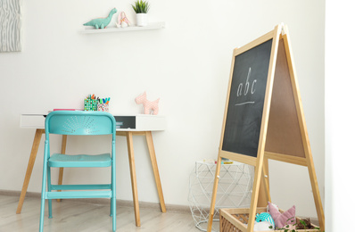 Modern child room interior with stylish furniture