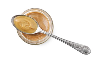 Photo of Fresh tasty mustard sauce in bowl and spoon isolated on white, top view