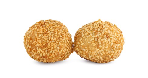 Photo of Two delicious sesame balls on white background