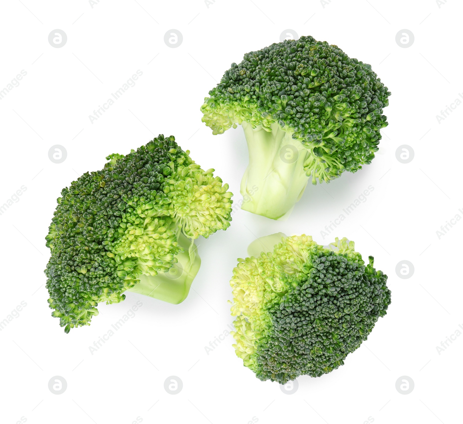 Fresh green broccoli on white background, top view. Organic food Photo of Fresh green broccoli on white background, top view. Organic food