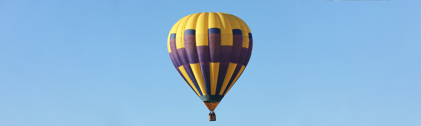 Image of Hot air balloon in blue sky. Banner design 