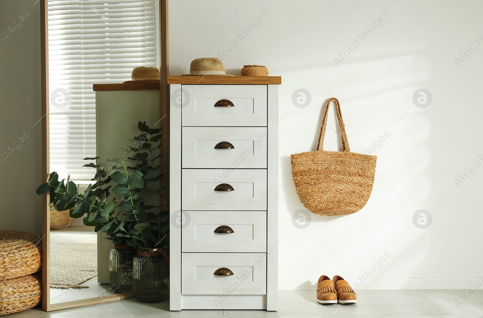 Photo of Chest of drawers in stylish room interior