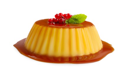 Delicious pudding with caramel, redcurrants and mint isolated on white