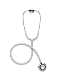 Modern stethoscope on white background, top view