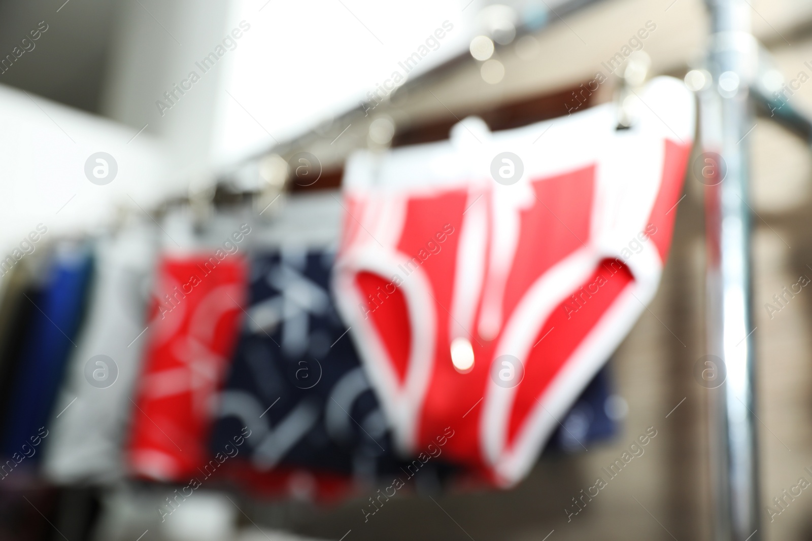 Photo of Blurred view of male underwear in boutique