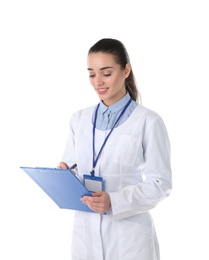 Young medical student with clipboard on white background