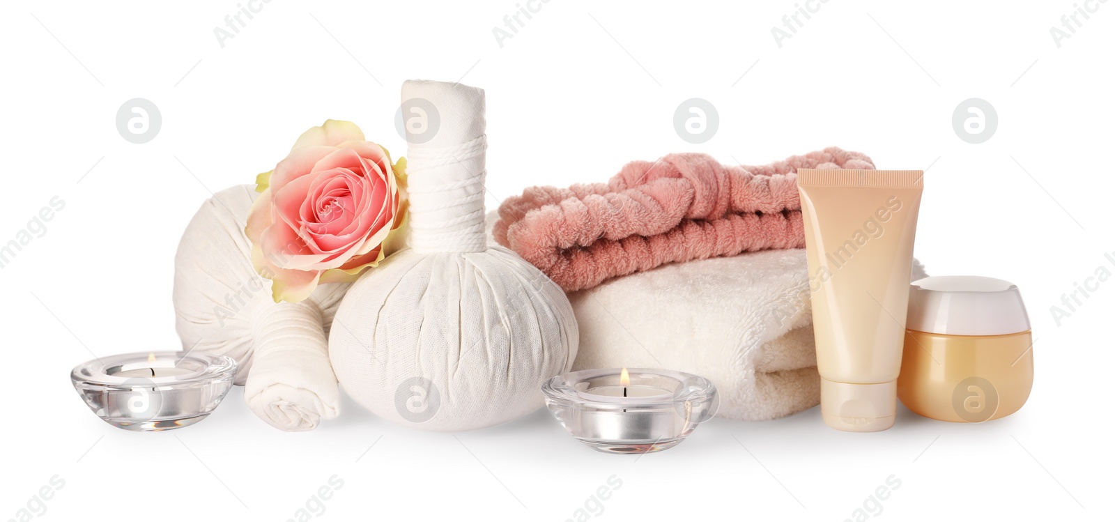 Photo of Beautiful spa composition with different care products, flower and burning candles on white background