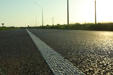 Photo of View of asphalt road on sunny day, closeup