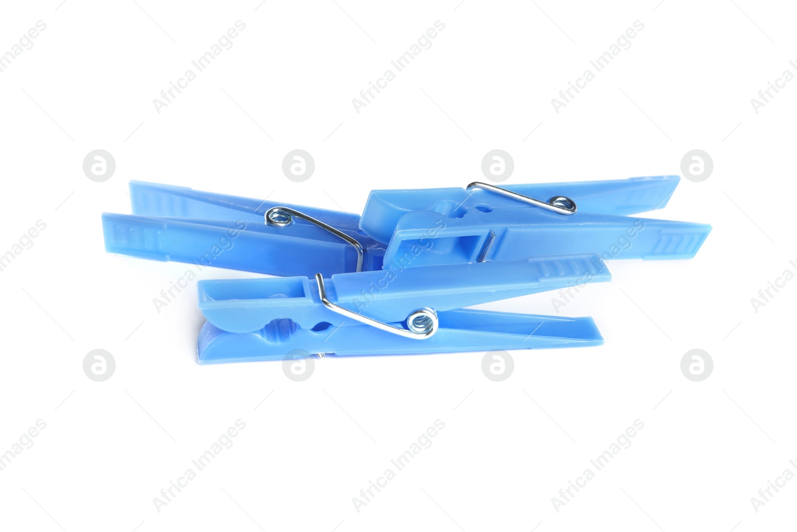 Photo of Light blue plastic clothespins on white background