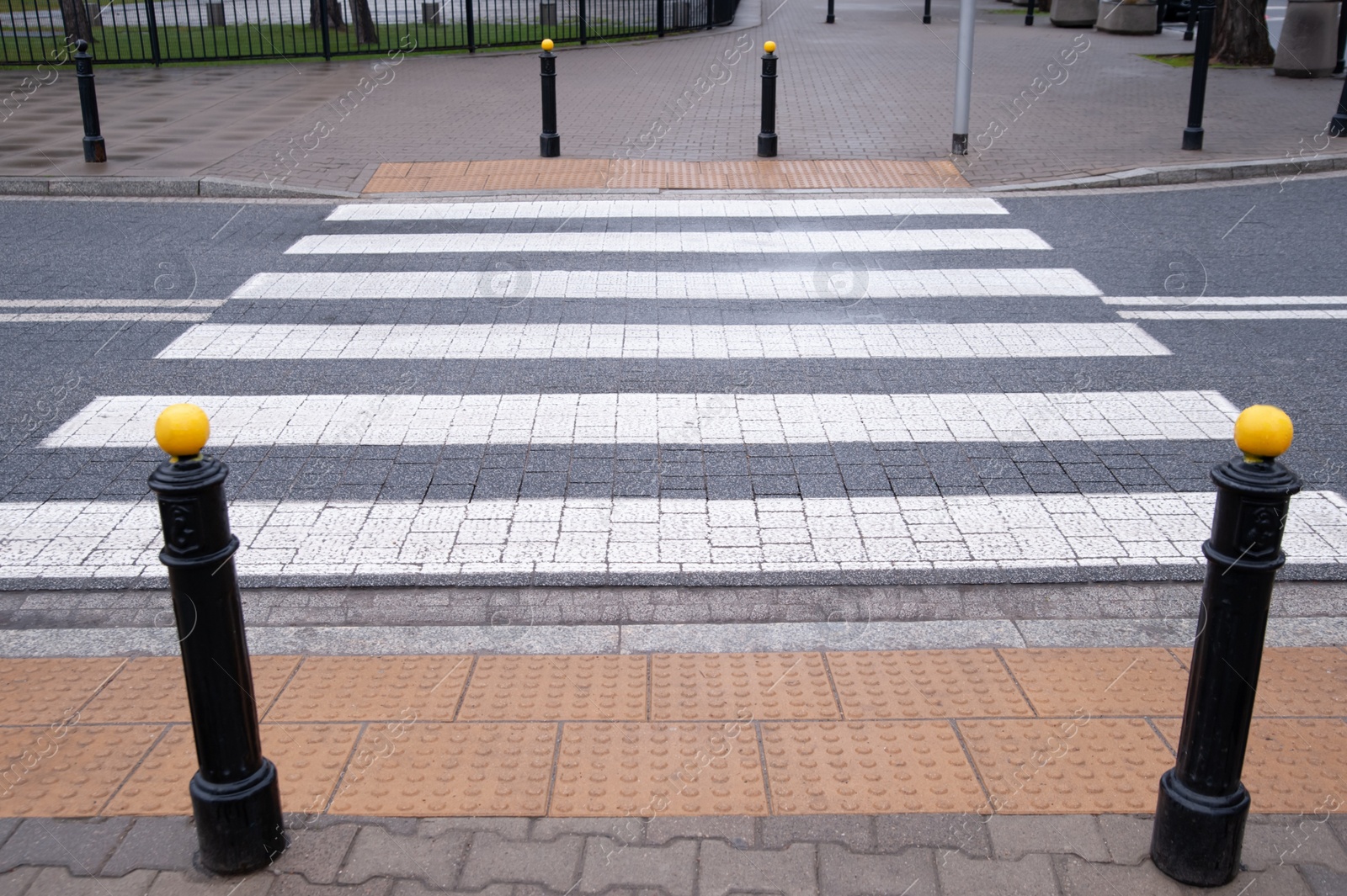 Photo of View on pedestrian crossing in city. Road regulations