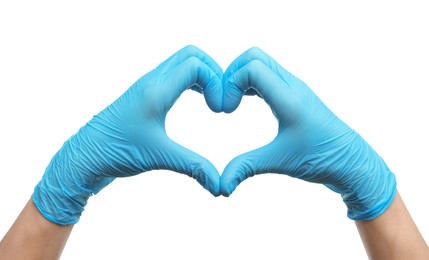 Doctor wearing light blue medical gloves making heart gesture on white background, closeup