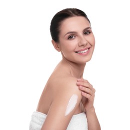 Photo of Beautiful woman with smear of body cream on her shoulder against white background