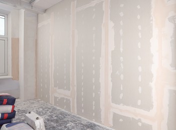 Photo of Wall with putty in room. Home renovation