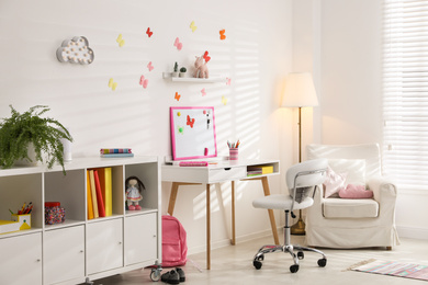 Photo of Modern child room interior with stylish furniture