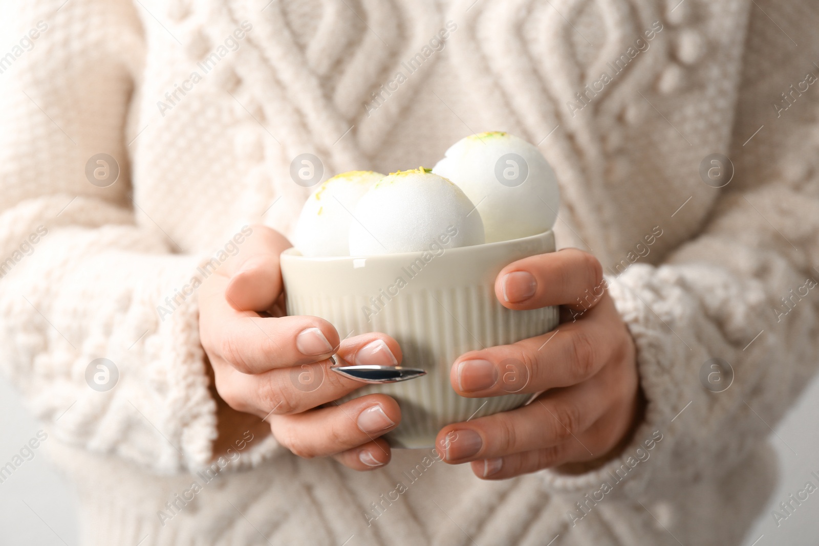 Photo of Woman with bowl of snow ice cream, closeup