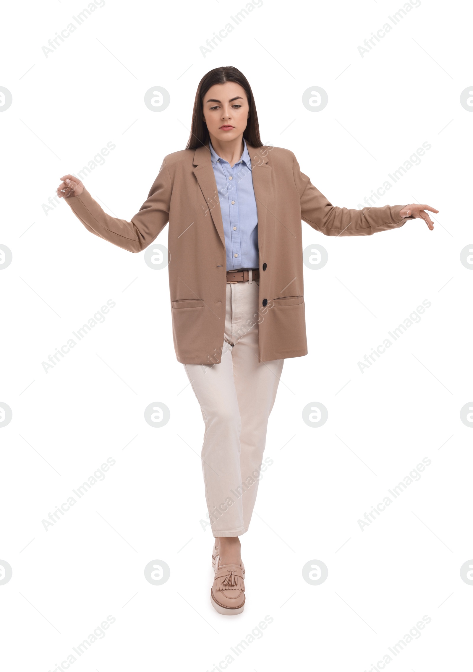 Photo of Beautiful young businesswoman posing on white background