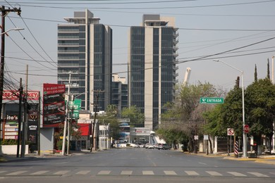 San Pedro Garza Garcia, Mexico – March 20, 2023: Beautiful view of city street with road and buildings