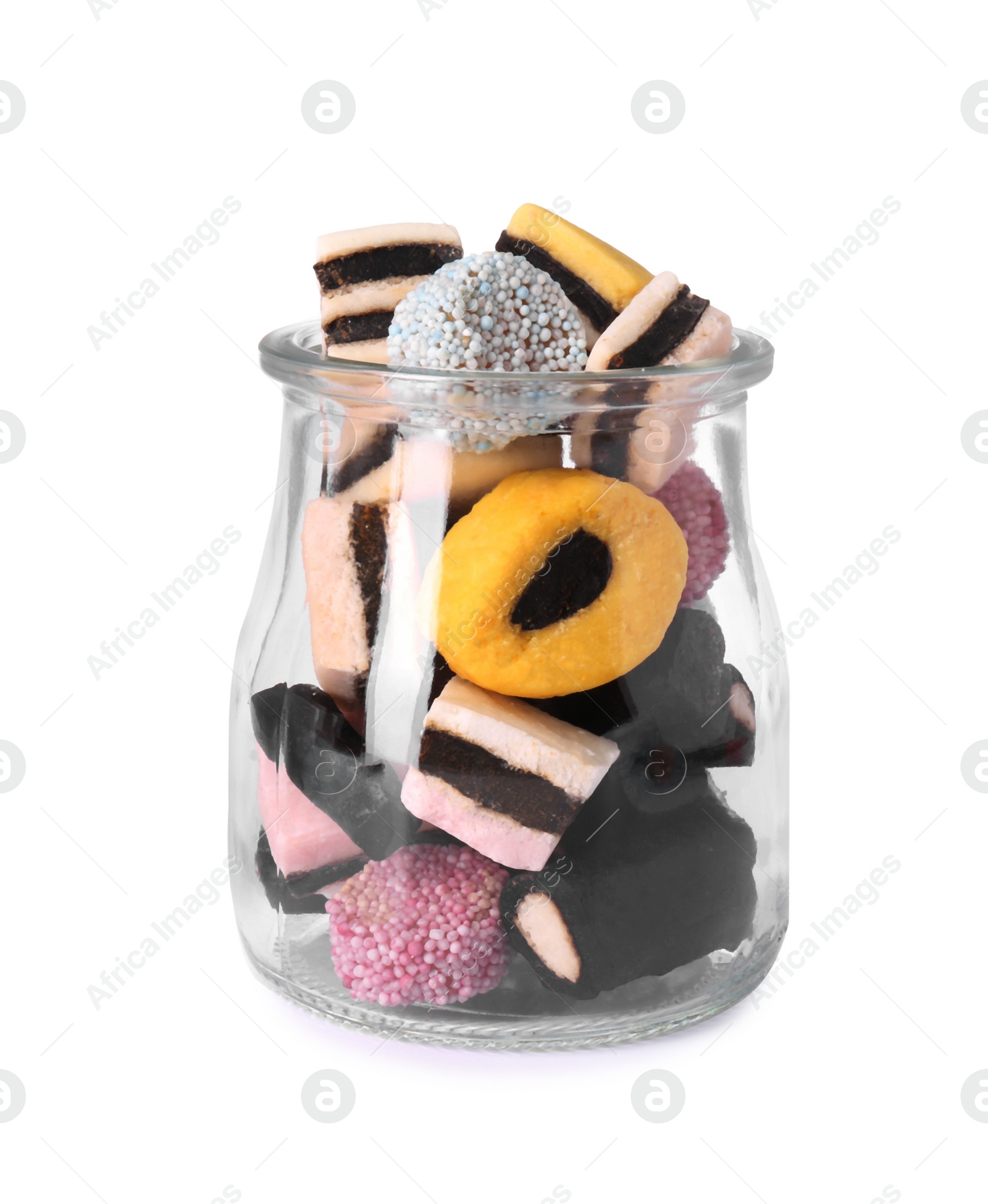 Photo of Glass jar of tasty liquorice candies isolated on white