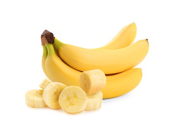 Image of Delicious ripe bananas and pieces on white background