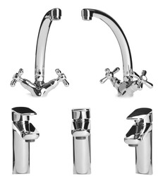 Image of Set with new water faucets on white background