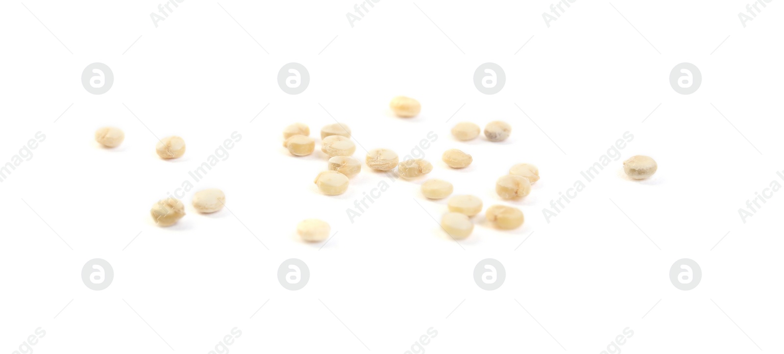 Photo of Many raw quinoa seeds on white background