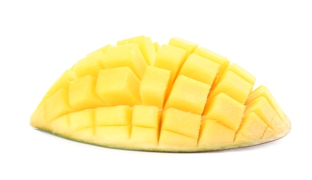 Cut ripe mango on white background. Tropical fruit