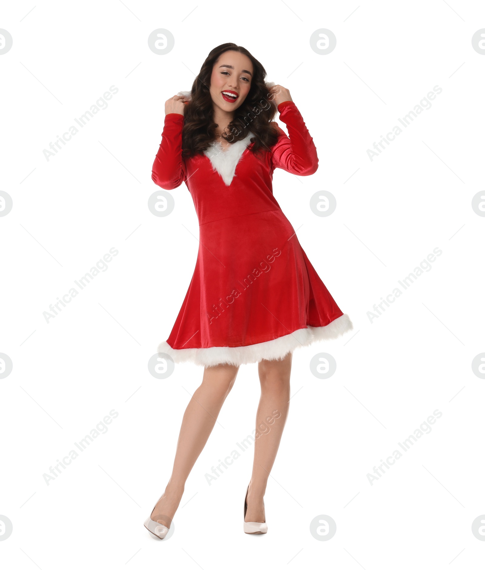 Photo of Beautiful young woman in Christmas red dress isolated on white