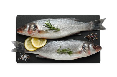 Photo of Fresh sea bass fish and spices on white background, top view