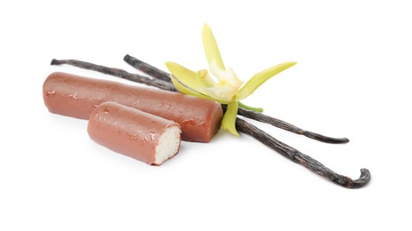 Glazed curd cheese bars, vanilla pods and flower isolated on white