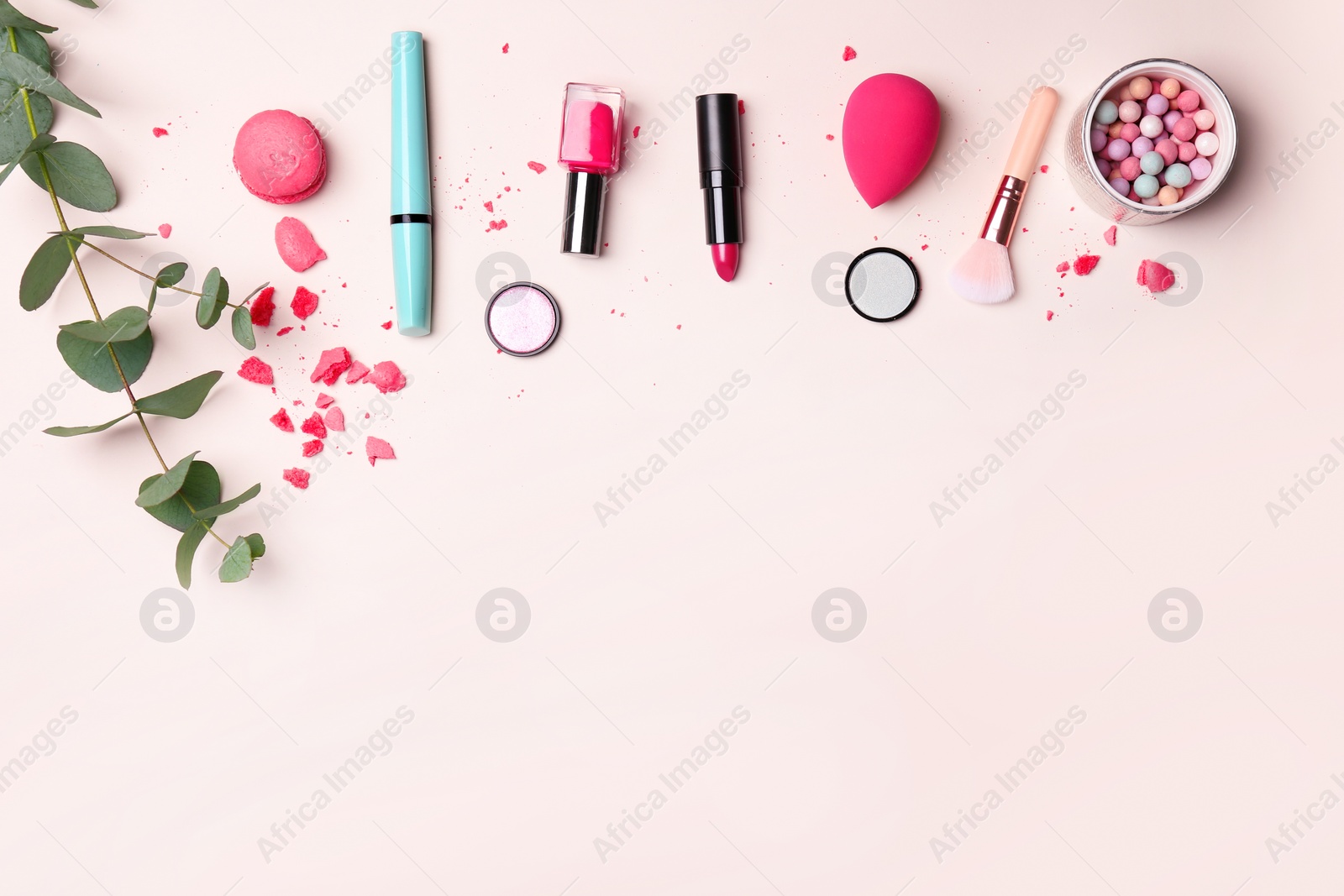 Photo of Decorative makeup products on color background