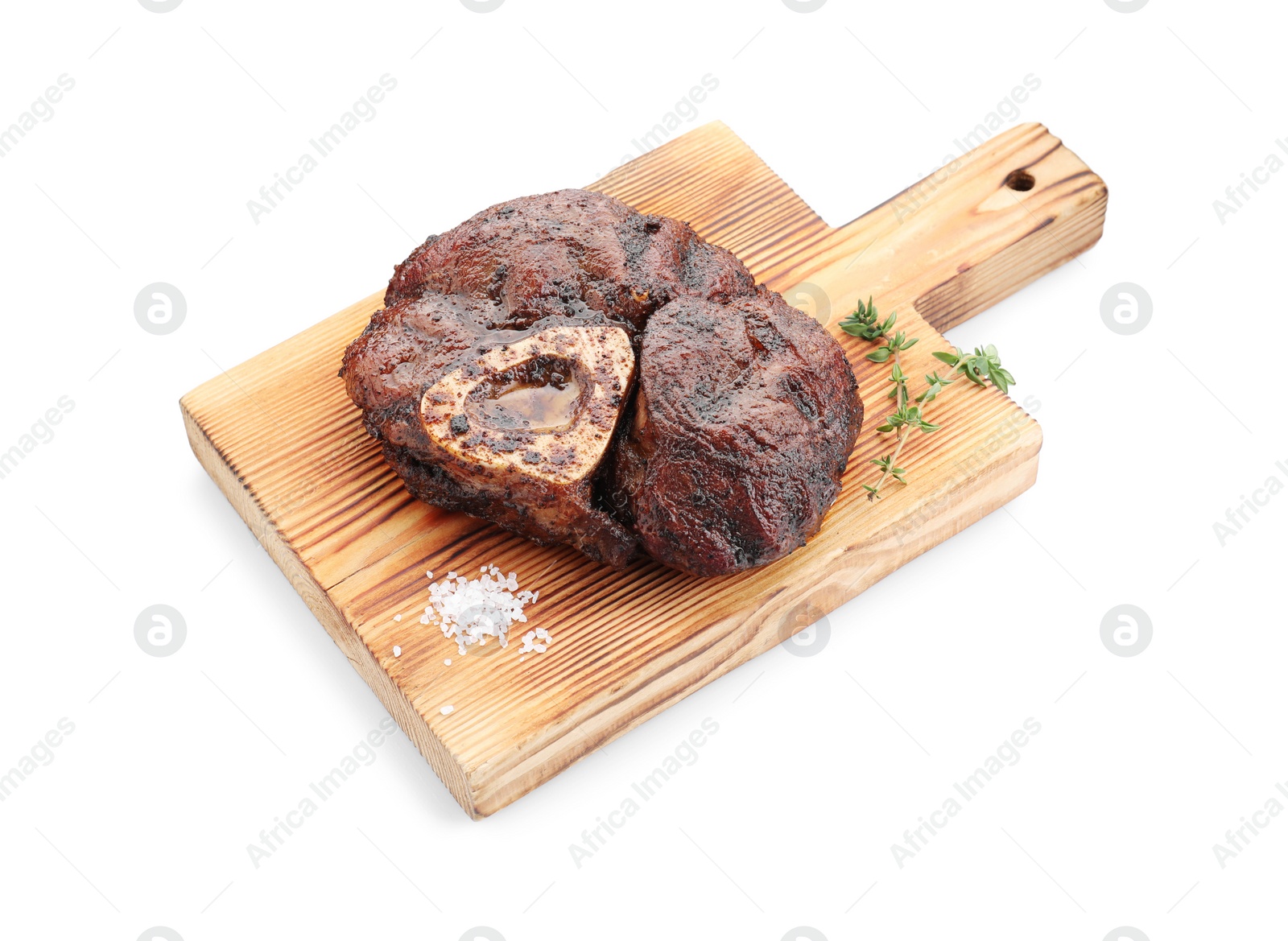 Photo of Piece of delicious grilled beef meat, thyme and salt isolated on white