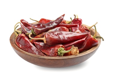 Photo of Plate with dry chili pepper on white background