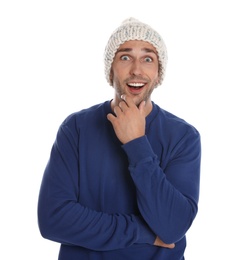 Happy young man in hat and blue sweatshirt on white background. Winter season