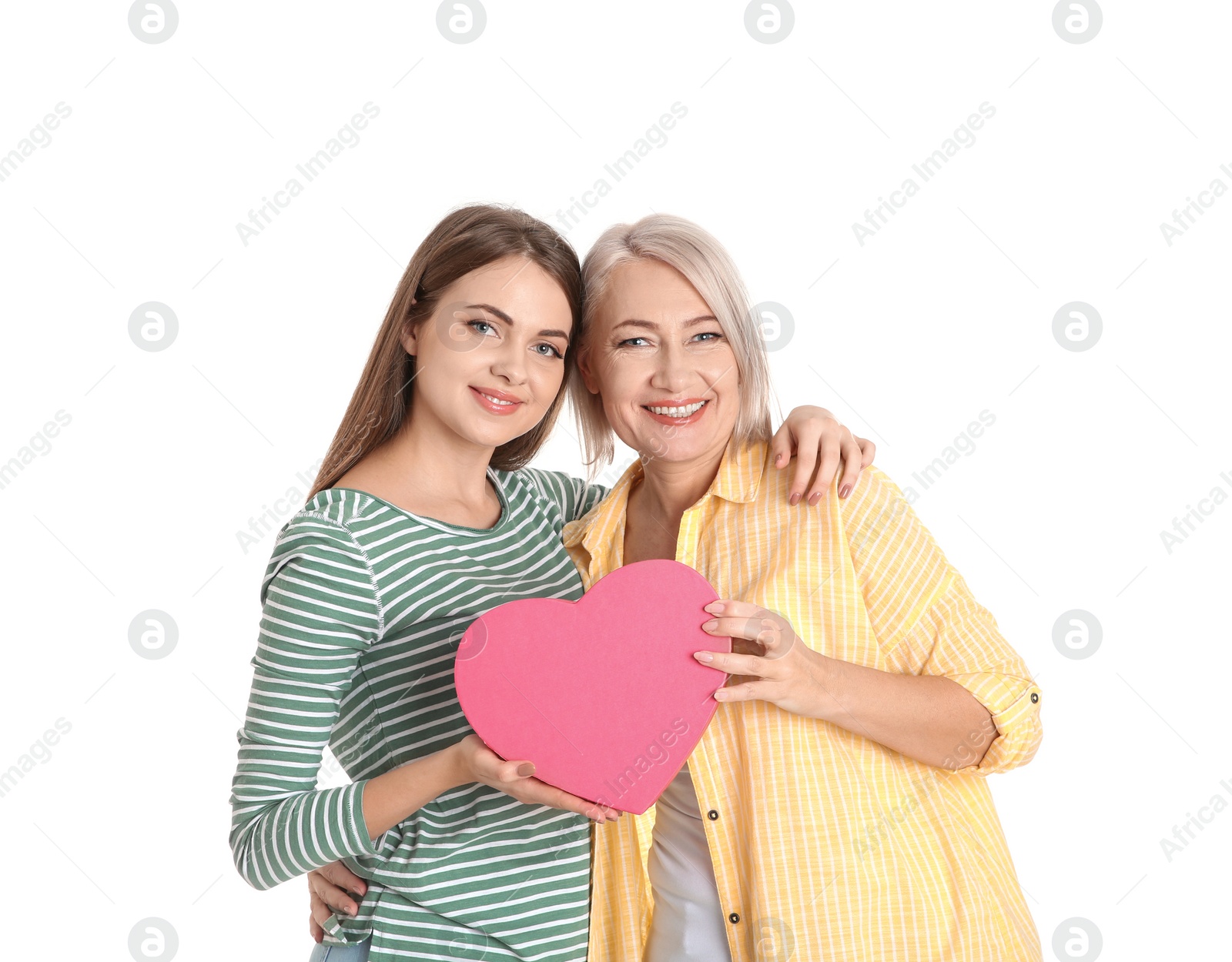 Photo of Young daughter congratulating her mature mother on white background. Happy Women's Day