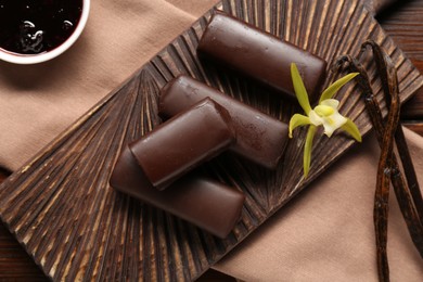 Glazed vanilla curd cheese bars served on table, closeup