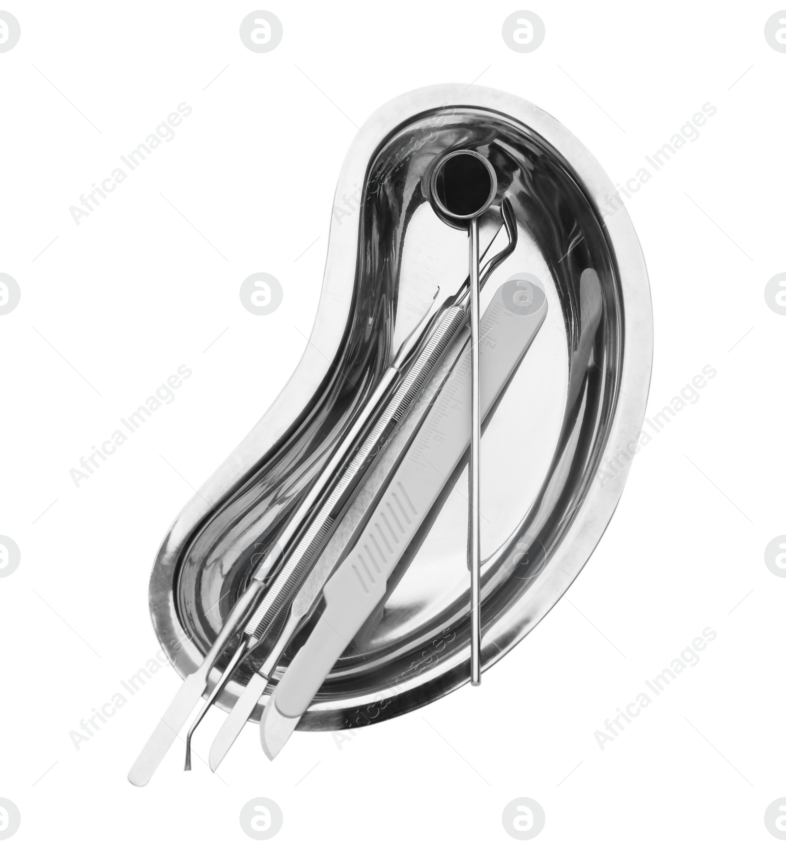 Photo of Kidney shaped tray with set of dentist's tools isolated on white, top view