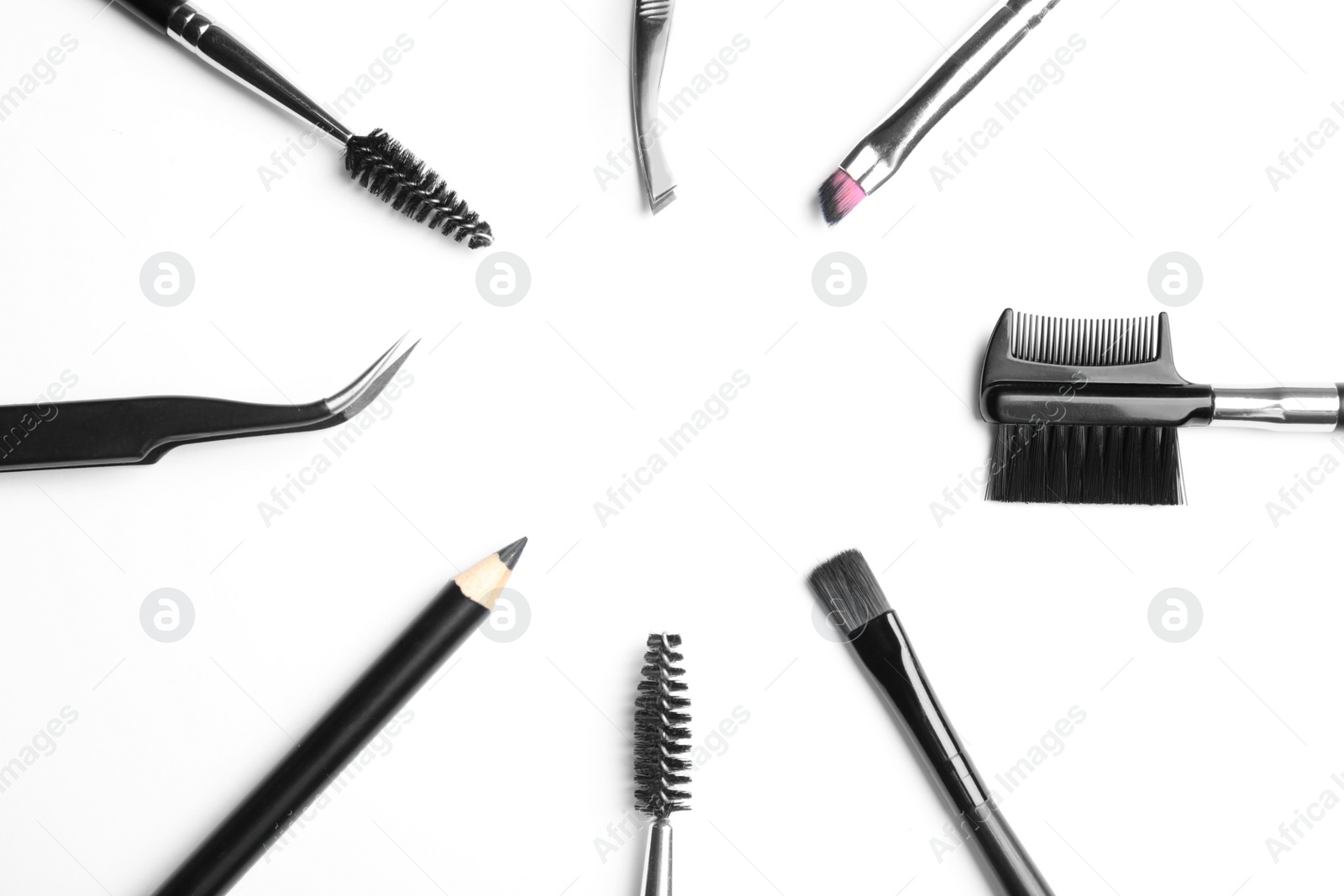 Photo of Set of professional eyebrow tools on white background, top view