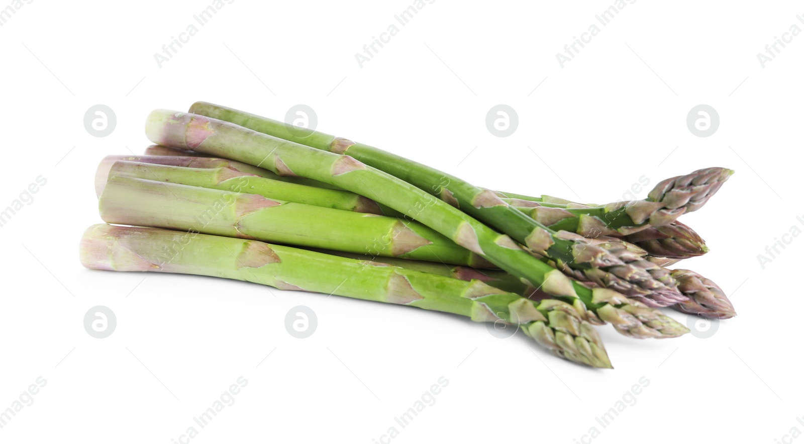 Photo of Fresh raw asparagus isolated on white. Healthy eating