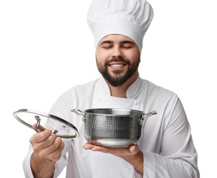 Photo of Happy young chef in uniform holding cooking pot on white background