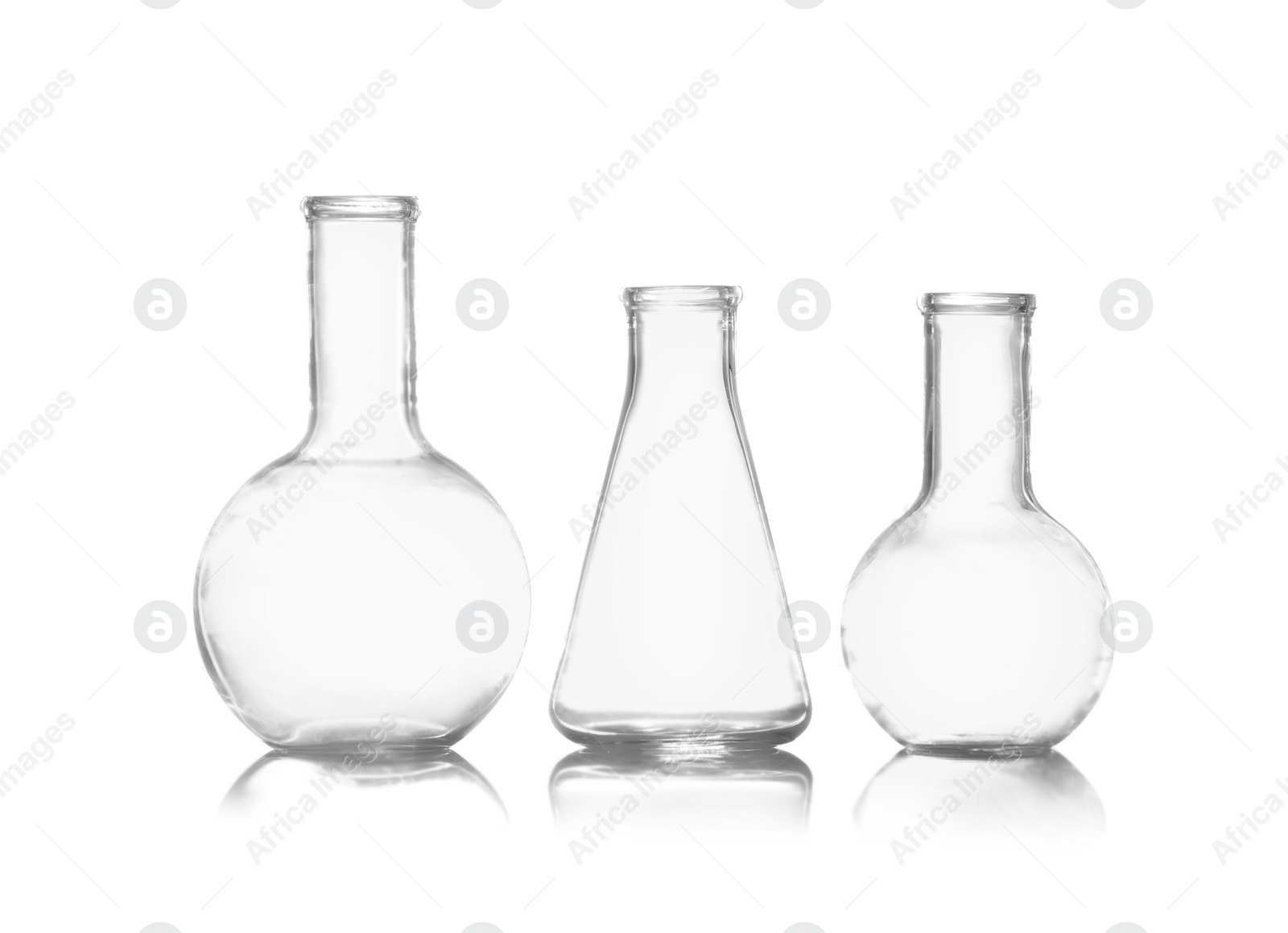 Photo of Group of empty chemistry glassware isolated on white