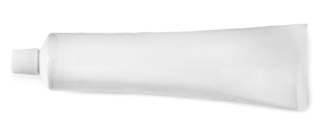 Photo of Blank tube of toothpaste isolated on white, top view