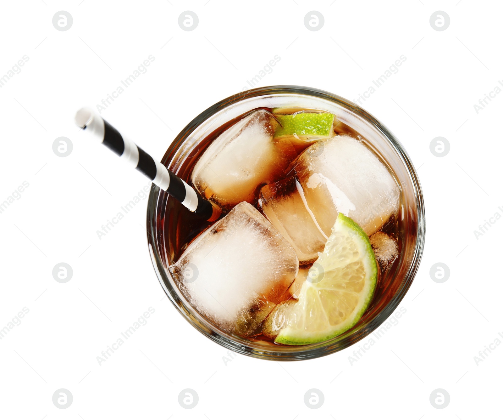 Photo of Glass of cocktail with cola, ice and cut lime on white background, top view