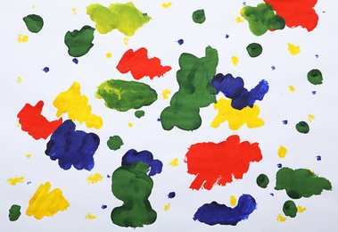 Photo of Abstract child's painting on white paper, top view