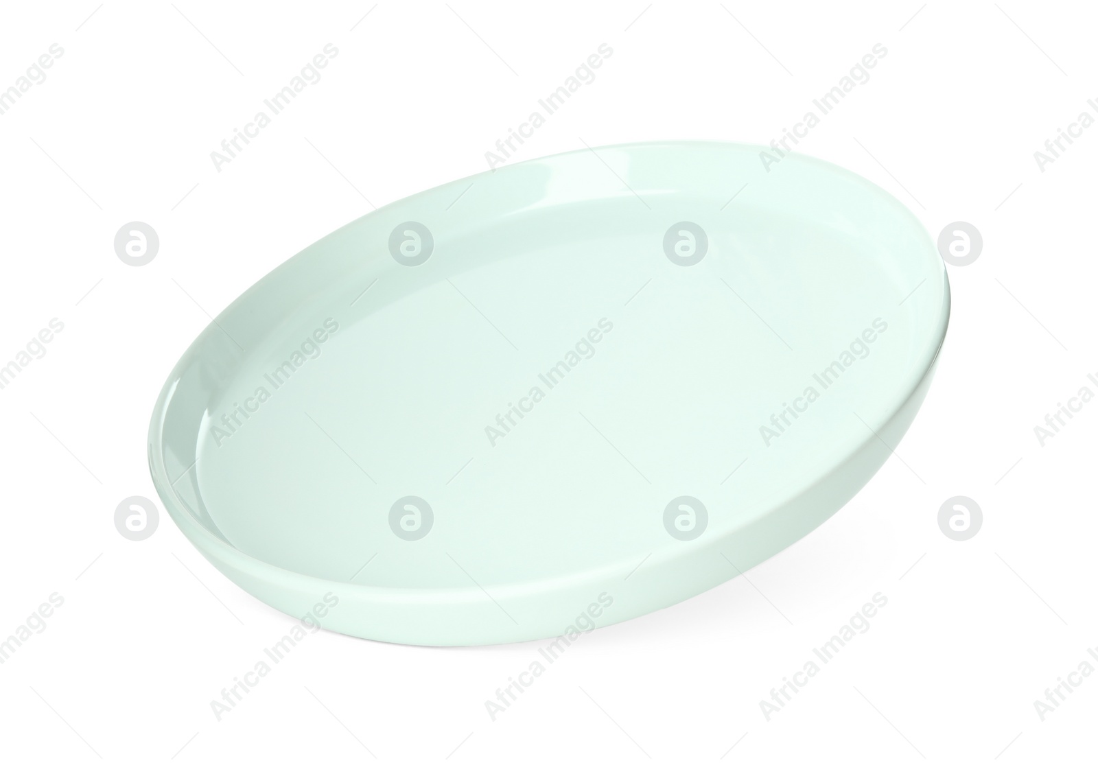 Photo of Clean light blue plate isolated on white