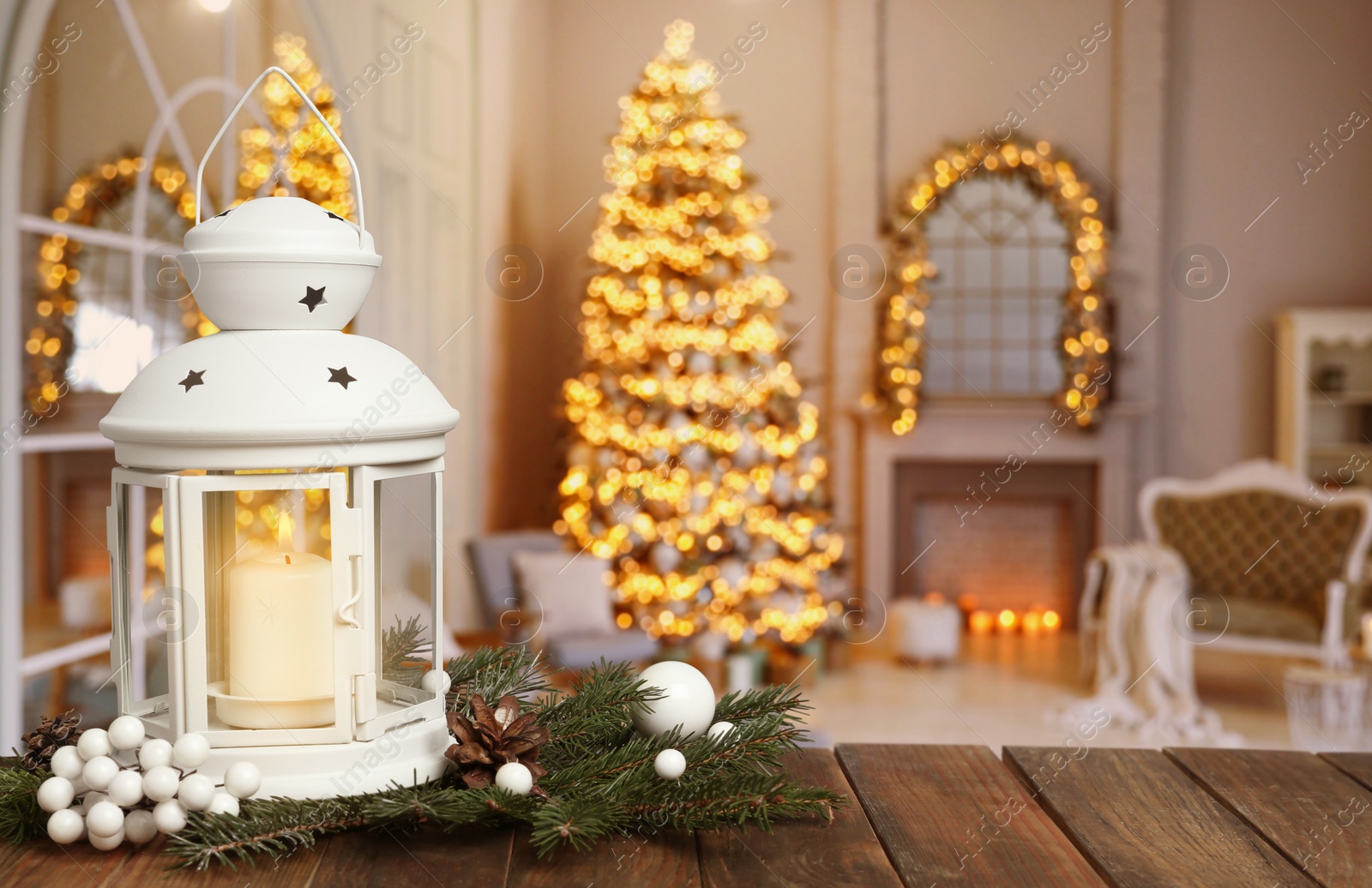 Image of Composition with Christmas lantern on table in decorated room, space for text